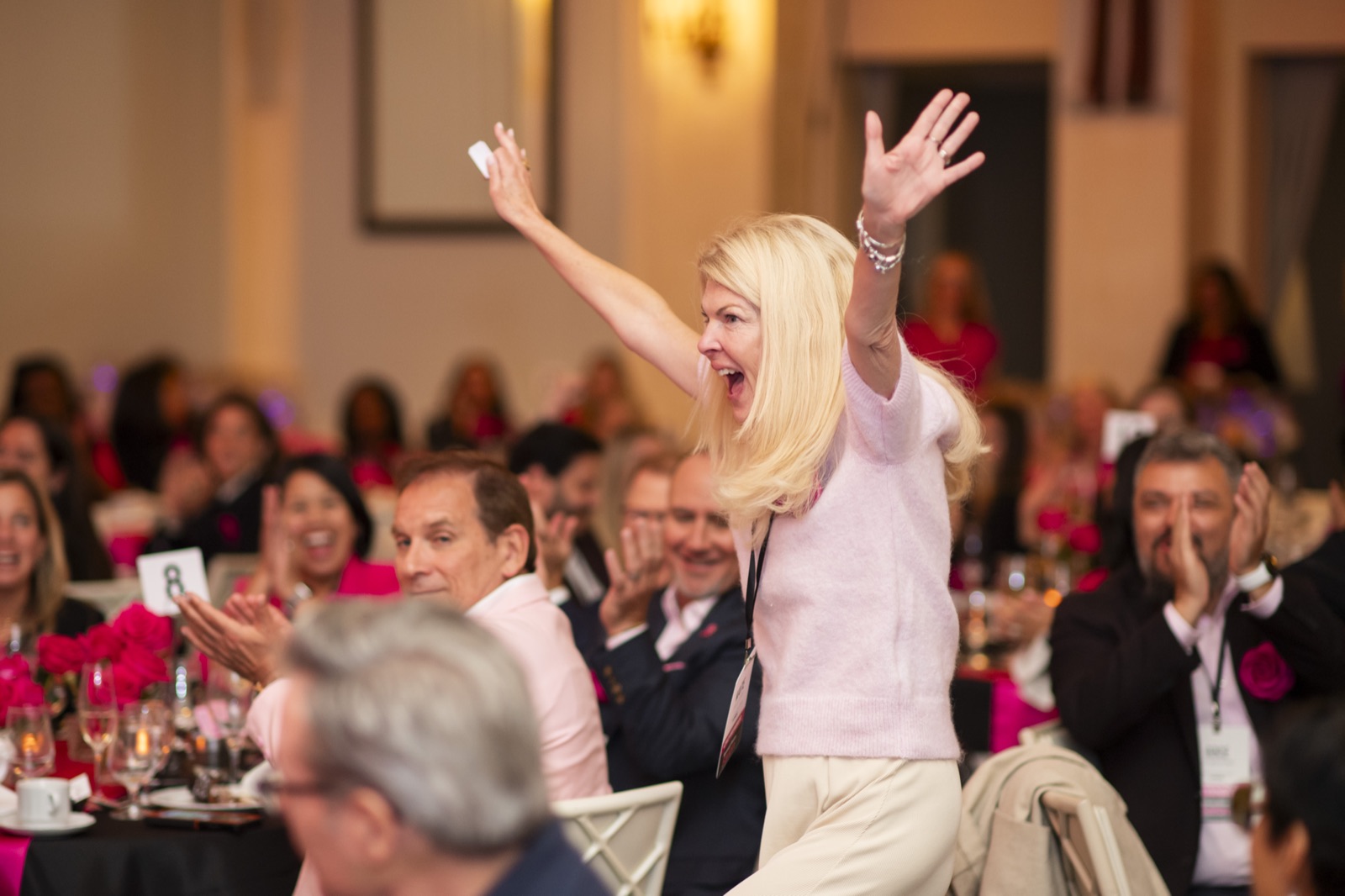 A guest celebrating during Revenue Room™ Salon 2026
